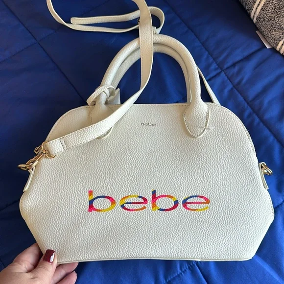 bebe white purse with rainbow branding - Picture 1 of 8